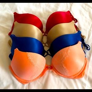 A set of 4 Victoria Secret Bombshell bras.